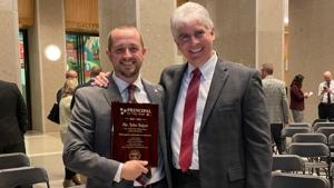 Tyler Salyer and Dr. Gary Lilly at Excellence in Education celebration