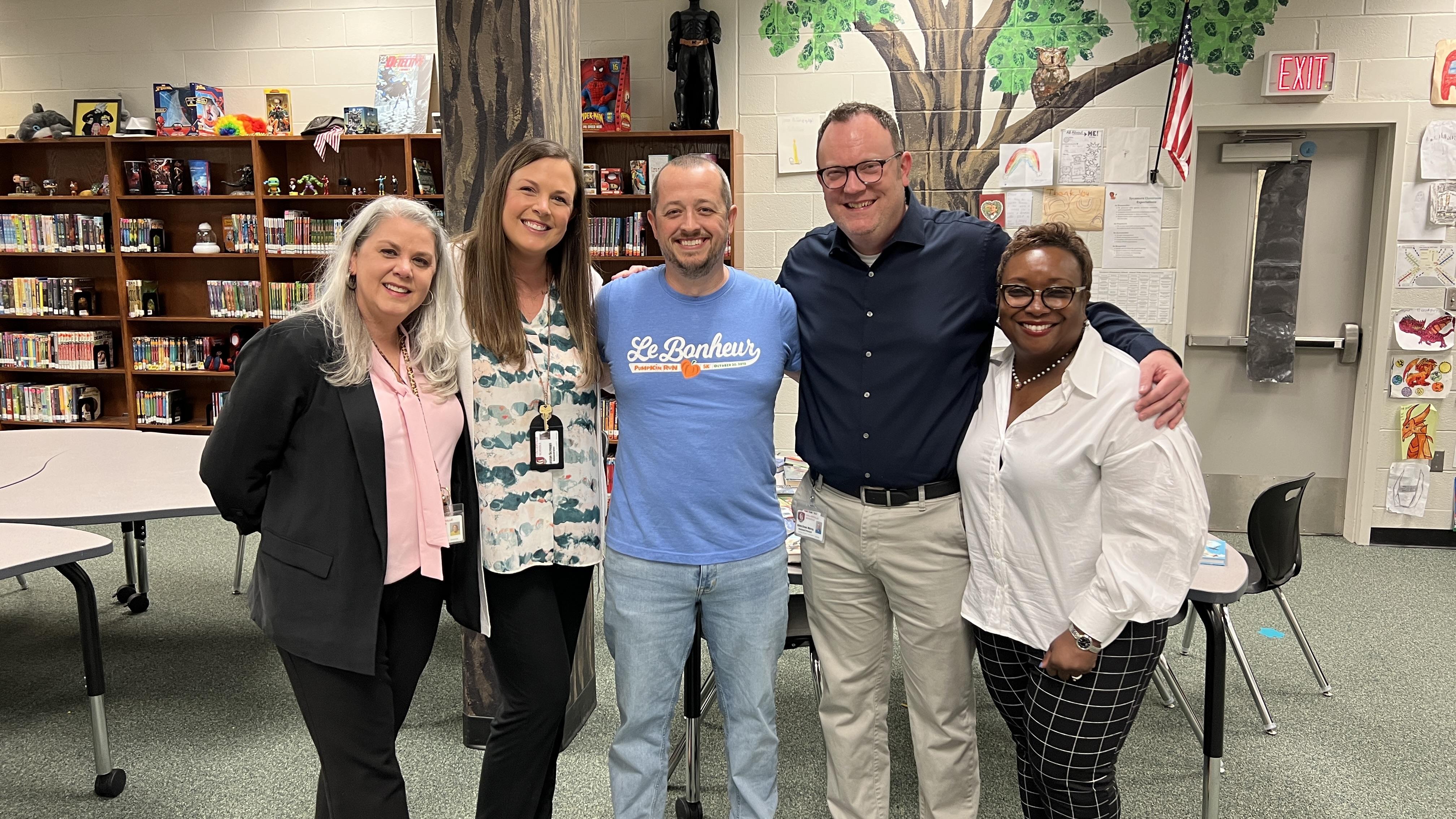 AP Shannon Dorris, AP Austyn Scruggs, Principal Tyler Salyer, AP Chris Murray, and AP Demetrius Mark stand together for a photo