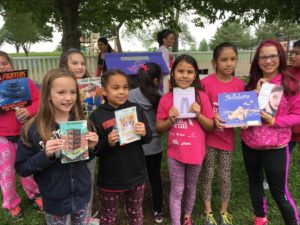 Girls holding books