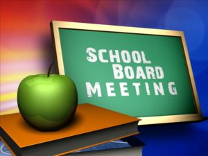 School Board Meeting Written on Chalkboard