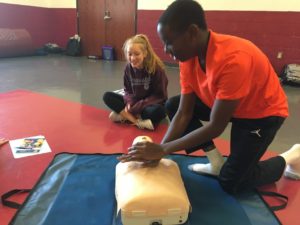 Student practicing CPR