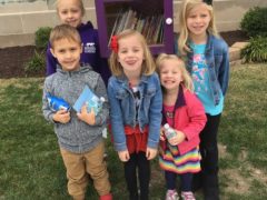 Kids Visit the Little Free Library on Clay Street