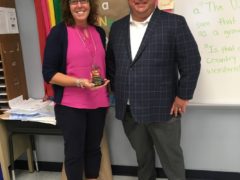 Webster Elementary Teacher Jackie Mitchell and Jason Rehg of Edward Jones