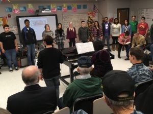 Veterans being entertained by CHS choir members