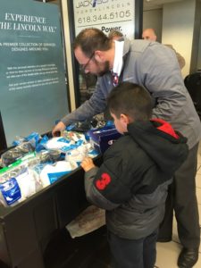 Boy picking out socks