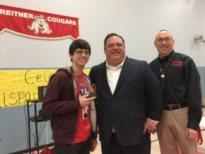 Teacher John Parciak receives Teacher of the Month award from Jason Rehg