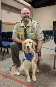 Webster Principal Brad Snow with Esther Comfort Dog 