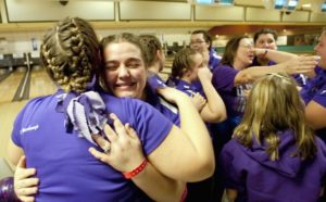 2009-10 Lady Kahok Bowlers hugging