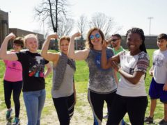 Participants in Kahoks United Boot Camp show strength