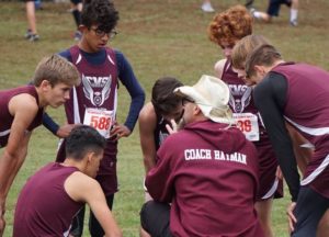 Mr. Hayman Coaching Cross Country Runners