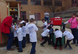 Webster Cub Scouts filling Blessing Box