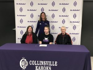 Cristle Buckman with family and coach