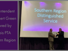 Dr. Green Receives Award from Greg Hobbs