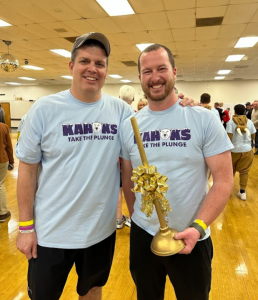 Dr. Brad Skertich congratulates Joe McGinnis