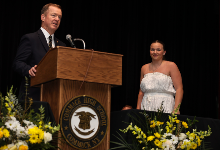 Emma H. receives her appointment to West Point on stage.