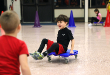 Student participates in relay race.