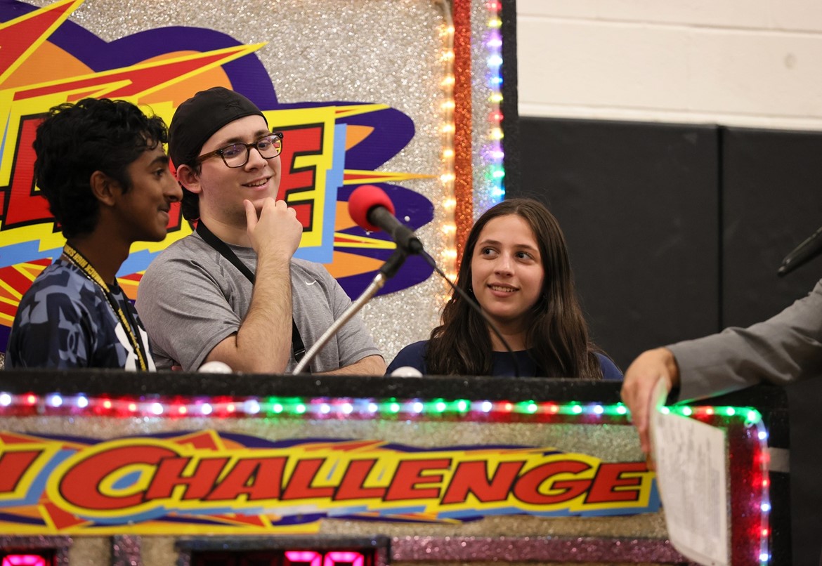 Students participate in mock game show during Commack Day.