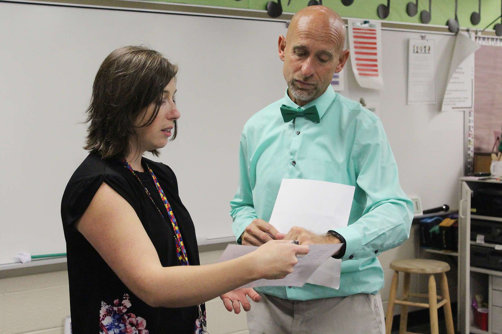 Tim Yoder helping a staff member