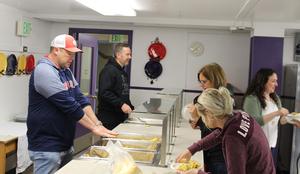 Principals serving breakfast