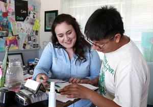 Melinda Torres helping a student