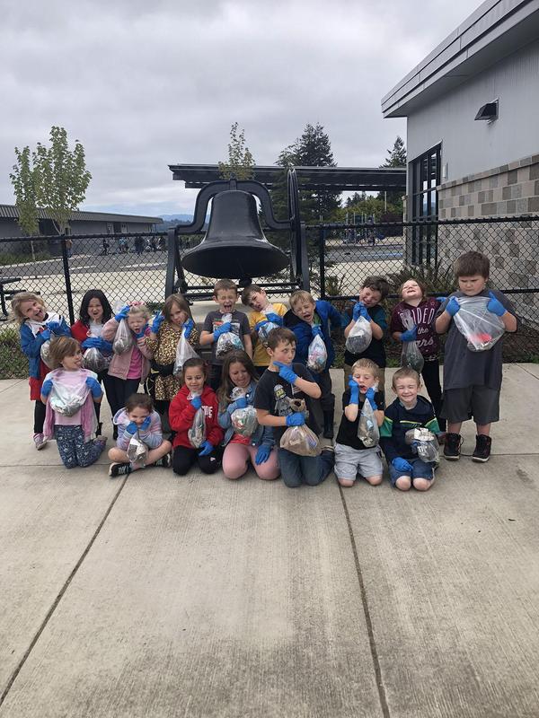 Kindergarteners clean up