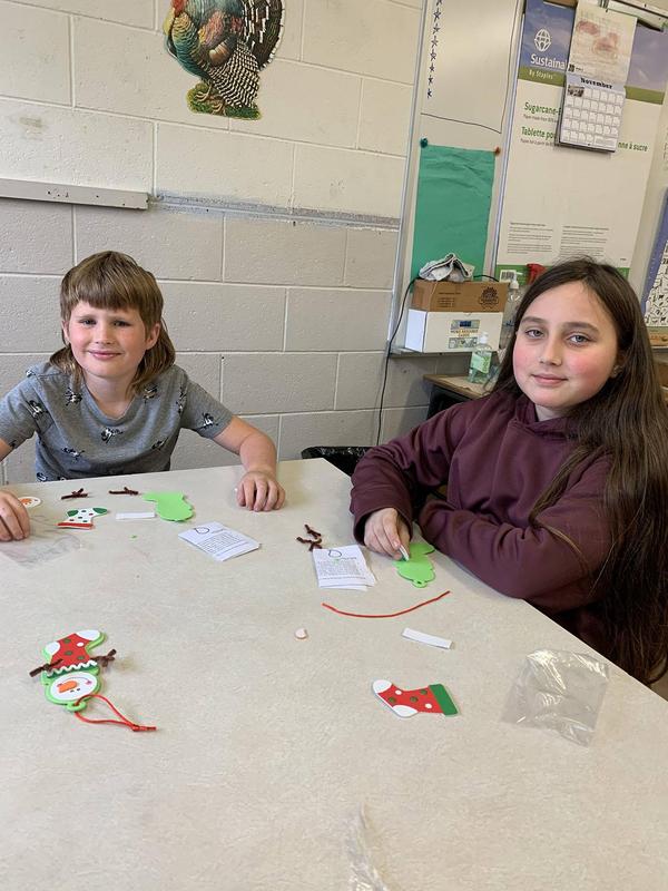 Students making ornaments