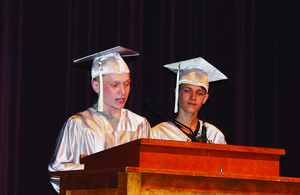 Buddy Lockwood, left, and Samuel Cagley address their fellow students during graduation ceremonies.