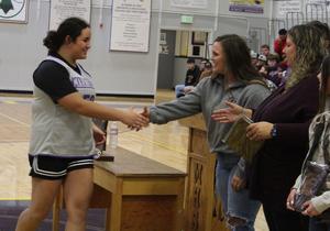 Tatum Montiel receiving the MVP award for volleyball