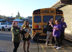 Tori Cox and Zoe Smith play the Marshfield fight song