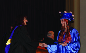 Resource Link graduate Savannah Key is congratulated by Lisa DeSalvio, director of special programs for Coos Bay School District.