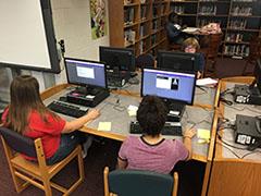 Students taking a test at a computer 