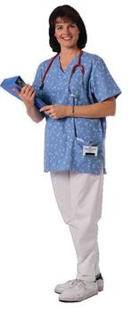 A nurse in blue scrubs holding a three ring binder. 