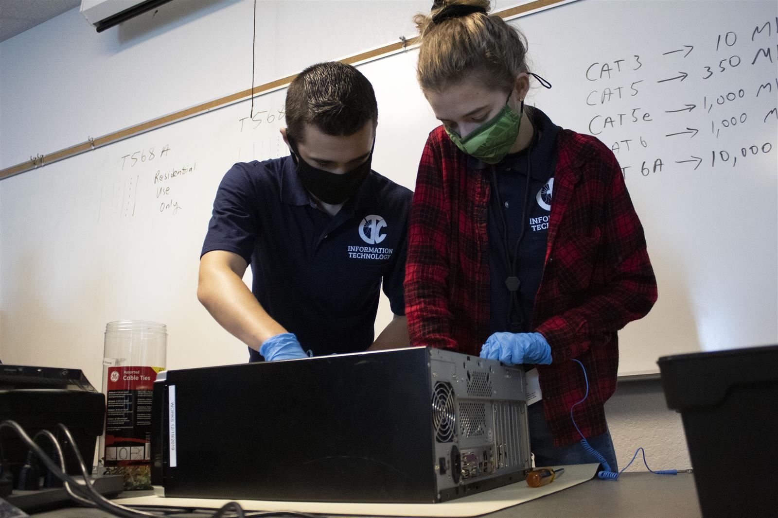 Students working on computer.