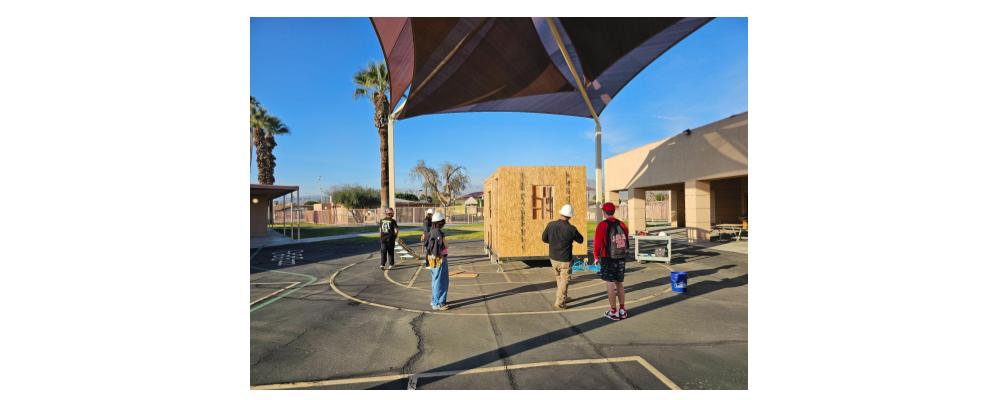 COD students survey construction progress of an ADA prototype housing unit