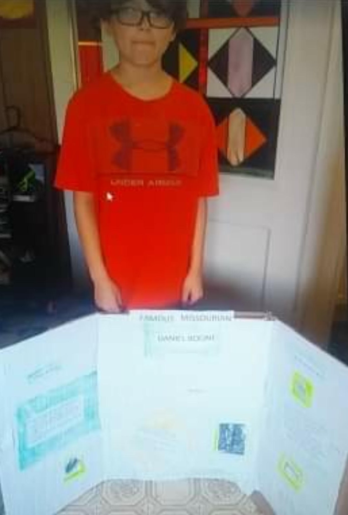 3rd grader Josiah showing his Famous Missourian school project to his teacher through remote learning during the COVID-19 school shutdown.