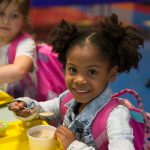 4J elementary school student eating breakfast in 2019. (Photo by Chris Pietsch)