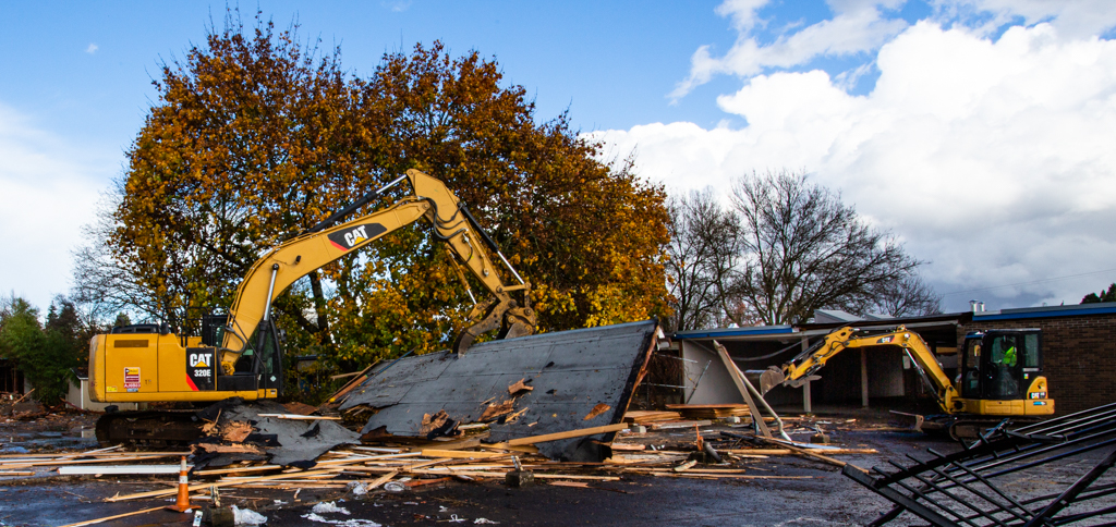 Pictured are two machines clearing debris at the Silver Lea building.