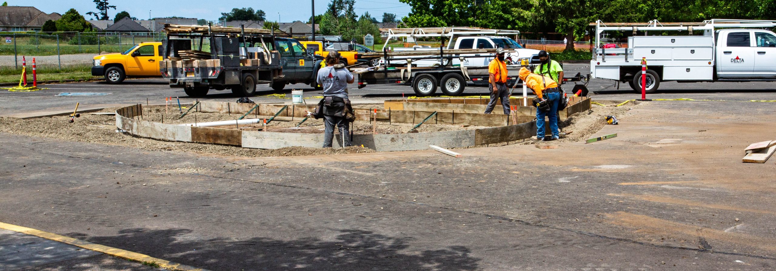 Gilham construction: construction crew hard at work on the parking lot.