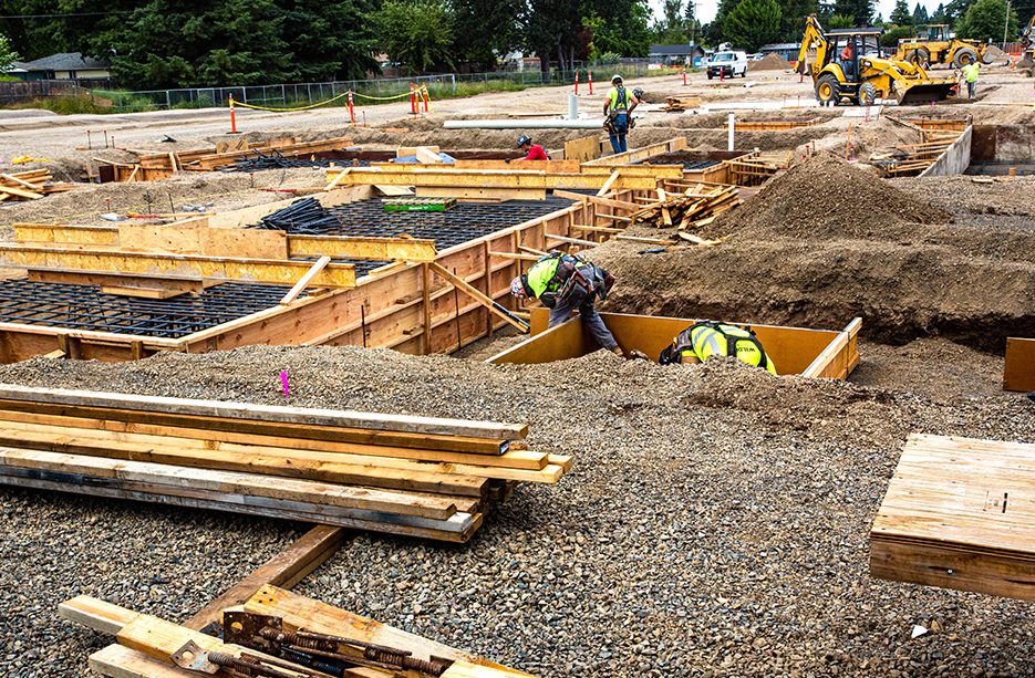 North build: Workers prepare the east side of the site.