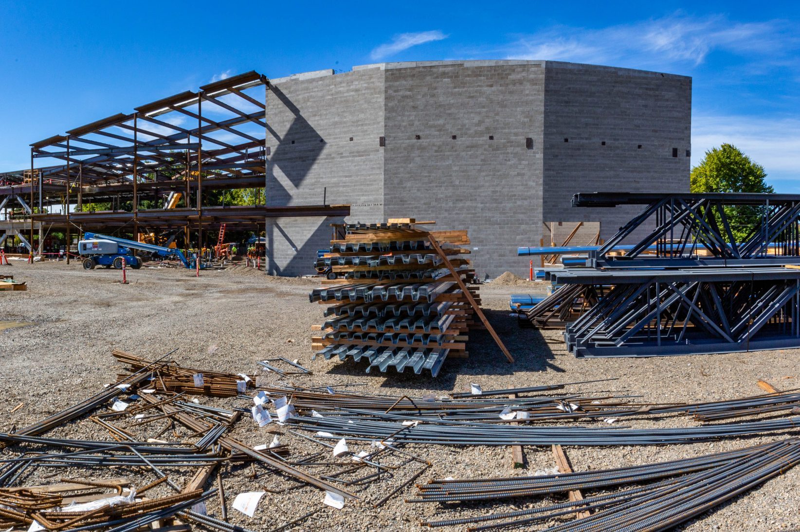 North build: panoramic view of the worksite and building materials.