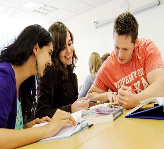 Students studying at a table 