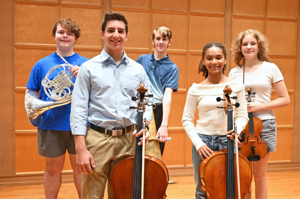 Five fairport students face the camera.