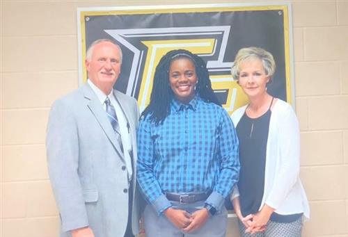 Kayla Magie with Superintendent Jim Cunningham and Assistant Superintendent Paula Muskett 
