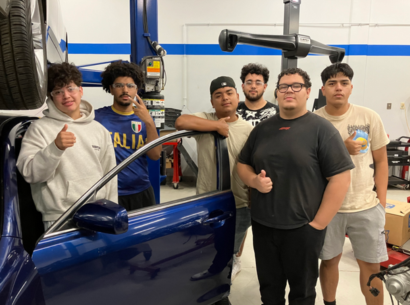  high school students participating in an automotive technology summer program