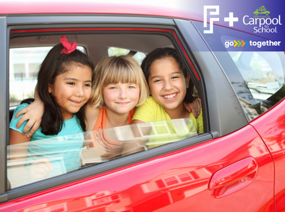 three young students sitting in car together, smiling