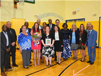 Board Recognizes Superhero