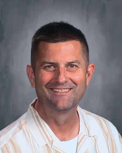 A portrait of John Cahill, Dean of Students