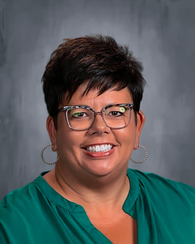 A portrait of Stacey Reau, Secretary