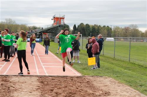 Fulton students participate in long jump event during olympiad 