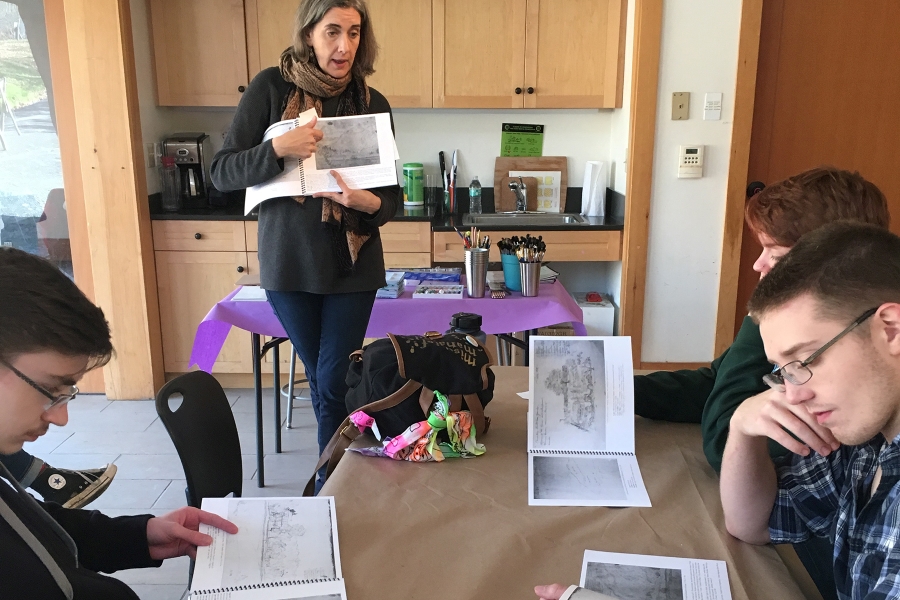 two art students with a docent